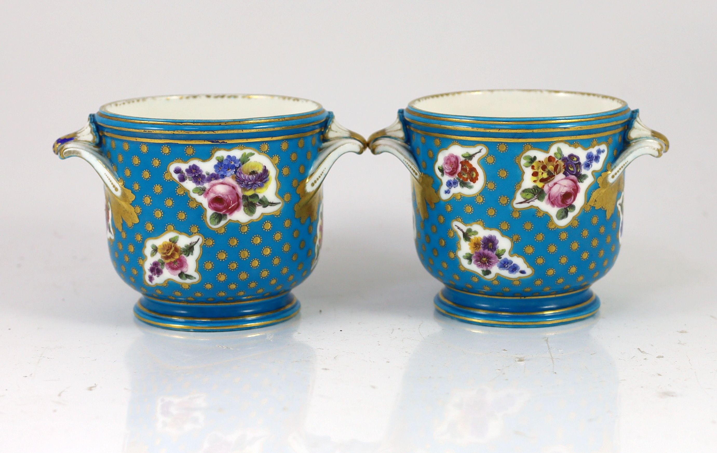 A pair of Sevres bottle coolers (seaux a bouteille) date code for 1764, 11cm highp